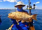 A Scamp Grouper landed on a slow pitch jig.